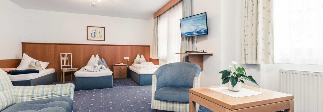 Doppelzimmer Komfort Nord mit Zustellbett - Andre Arnold - Boutique Hotel - Sölden