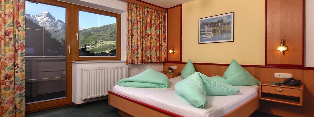 Doppelzimmer mit Zustellbett - Appartement Wiesenrand - Sölden