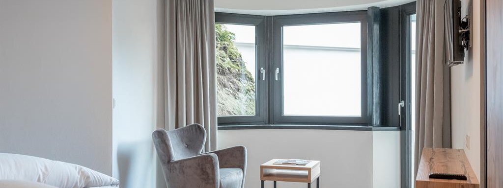 Schlafzimmer mit Gartenblick - CORSO living Aparthotel - Sölden