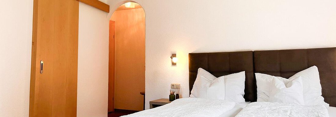 Schlafzimmer_doppelzimmerplus_bergheim3_WZ - Sporthotel Garni Bergheim - Sölden