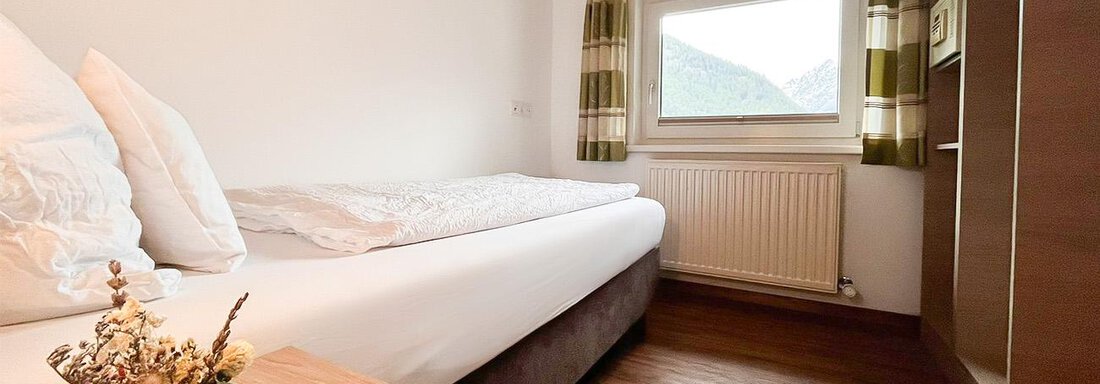 Schlafzimmer_juniorsuite_bergheim_6_WZ - Sporthotel Garni Bergheim - Sölden